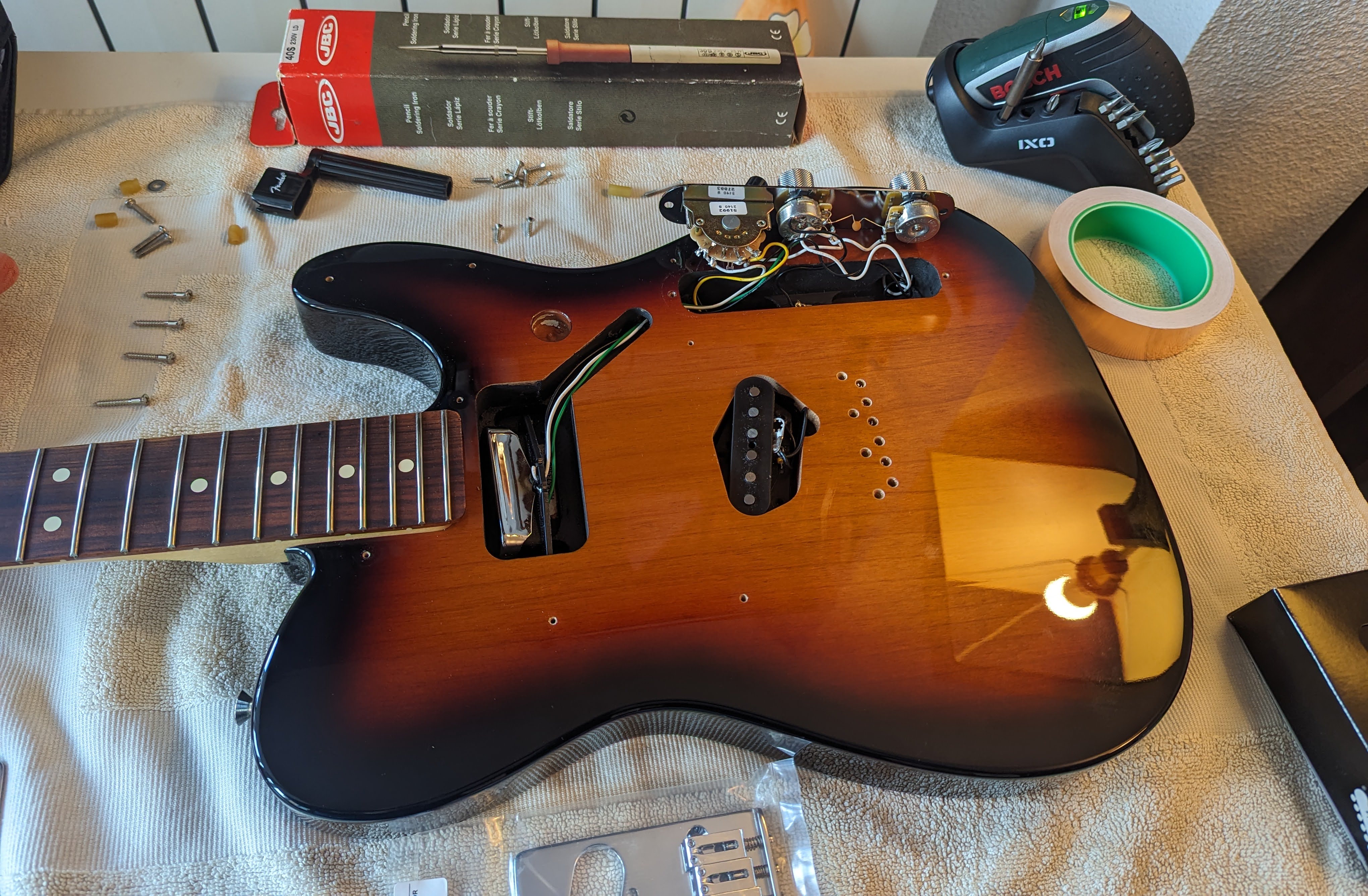 Miguel Pérez Colino working on a Fender Telecaster